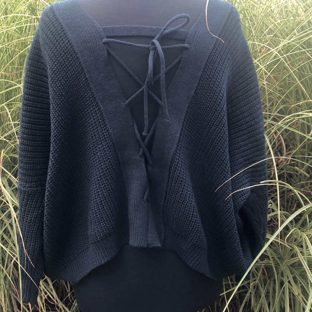 No tags. Custom made. Year round sweater